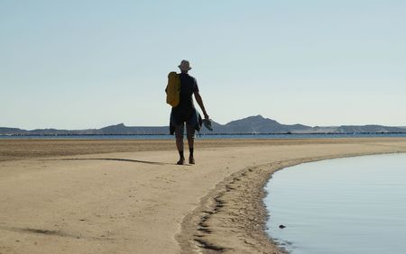 Man going up along coastlines Red Sea