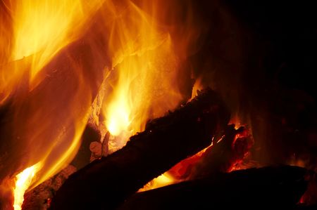 Camping fire on the black background