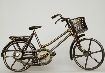 Small steel bike on white backgroundの写真素材