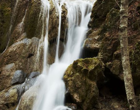 Waterfall movement on the stone backgroundの写真素材