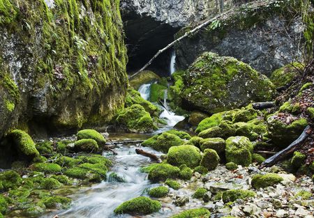 Waterfall movement on the stone backgroundの写真素材