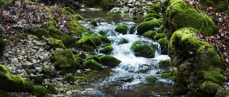 Beautiful small waterfull on mountain riverの写真素材