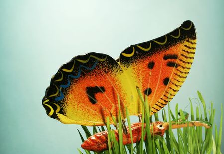 Butterfly toy in grassの写真素材