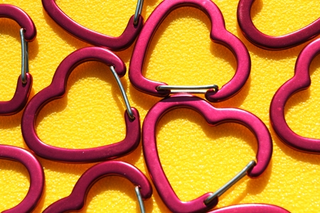 Toys hearts on yellow backgroundの写真素材