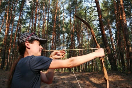 Girl-archer in the forestの写真素材