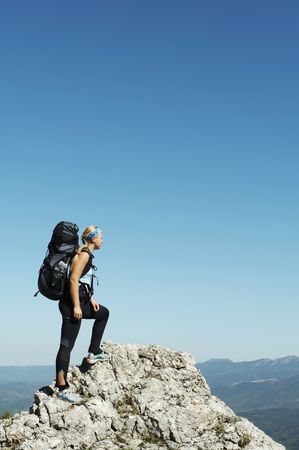 Girl overview landscapes in mountainの写真素材