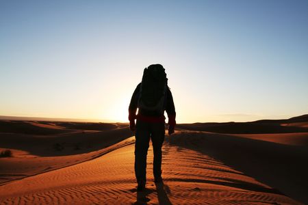 Man observer  sand desertの写真素材