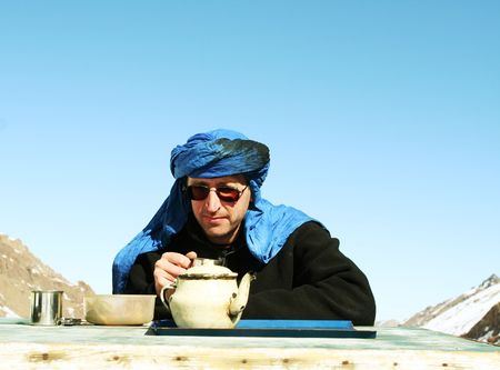 Tourist in Morocco drinking teaの写真素材
