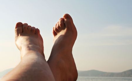 Legs on beach
