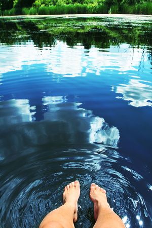 Relaxing on lakeの写真素材