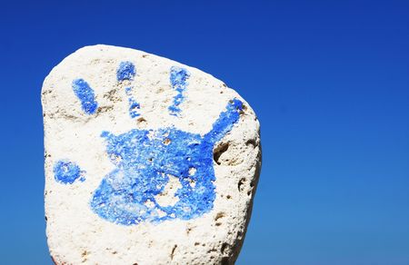 Hand print on stoneの写真素材