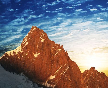 Mountains peak on sunrise