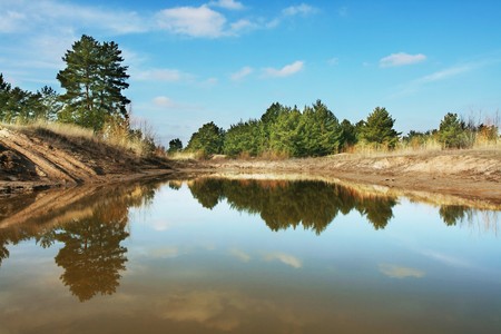 Lake in green grasslandの写真素材