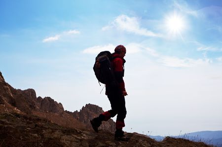 Backpacker in  mountains