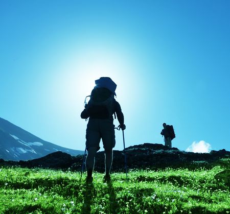 Backpacker in mountainの写真素材