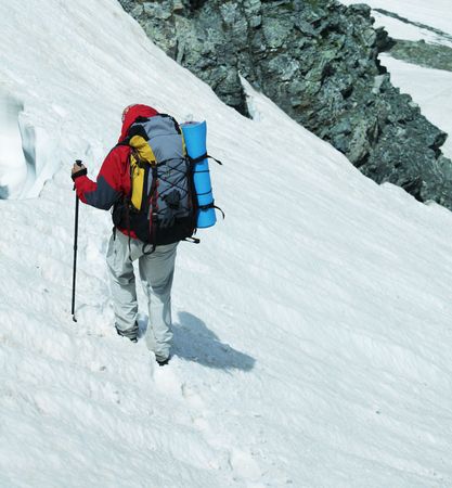 Backpacker in mountainの写真素材