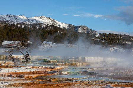 Man on thermal hot springの写真素材