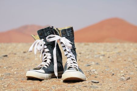Jeans shoe in desertの写真素材