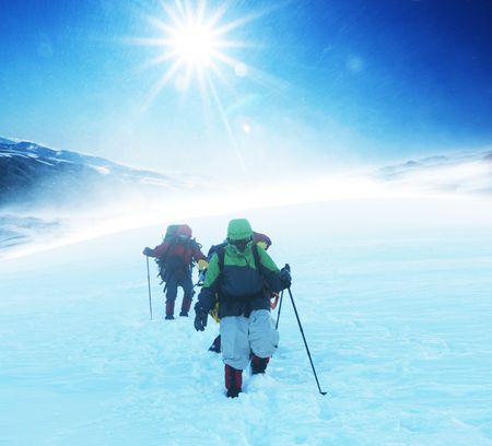 Hike in winter mountainの写真素材