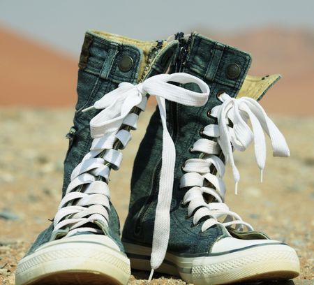 Jeans shoe in desertの写真素材