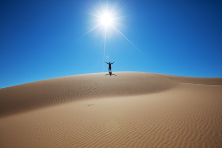 Hike in sand desertの写真素材