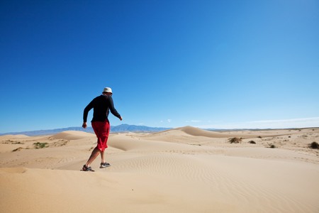 Hike in sand desertの写真素材