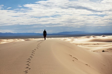 Hike in sand desertの写真素材
