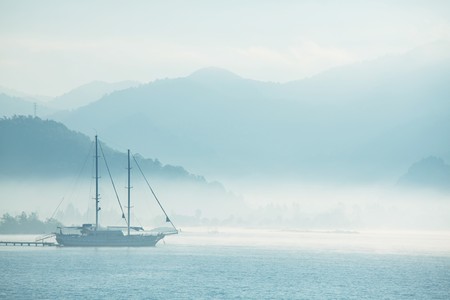 yacht in morning bayの写真素材