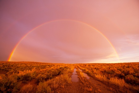 Rainbow in mountainsの写真素材