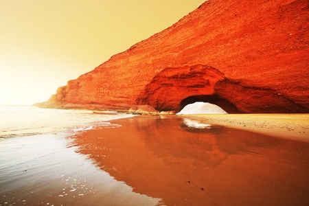 Arch rock formation on the beach, Moroccoの写真素材