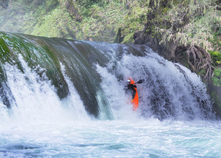 Kayaker in waterfallの写真素材