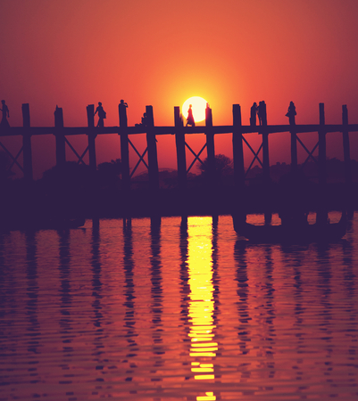 famous tick  bridge at sunset in Myanmarの写真素材