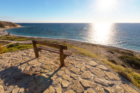 Bench on the sea coastの写真素材