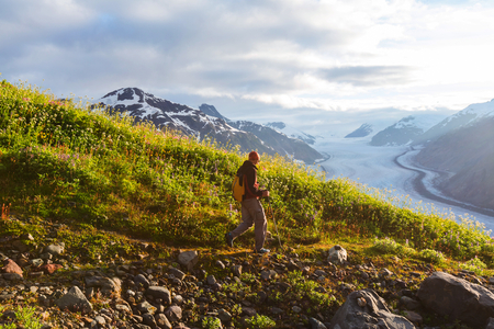 Hiking man in Canadian mountains. Hike is the popular recreation activity in North America. There are a lot of picturesque trails.の写真素材