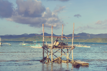 Traditional Philippino boat in the sea, Palawan island, Philippinesの写真素材