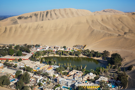 Huacachina Oasis, in the desert sand dunes near the city of Ica, Peru, South America. Unusual landscapes.の写真素材