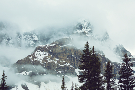 Snow covered mountains in winterの写真素材
