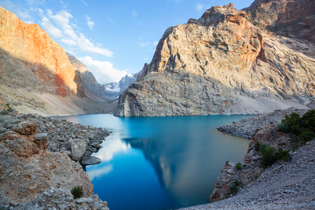 Beautiful serene lake in  Fann mountains (branch of Pamir) in Tajikistan.の写真素材
