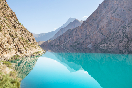 Beautiful serene lake in  Fann mountains (branch of Pamir) in Tajikistan.の写真素材