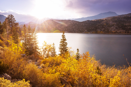 Beautiful nature scene in autumn mountains. Sierra Nevada lake reflection.の写真素材