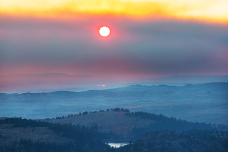 Scenic Sunset in the mountains in fall seasonの写真素材