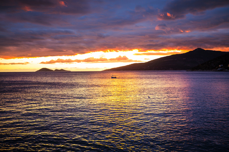 Scenic colorful sunset at the sea coast. Good for wallpaperの写真素材