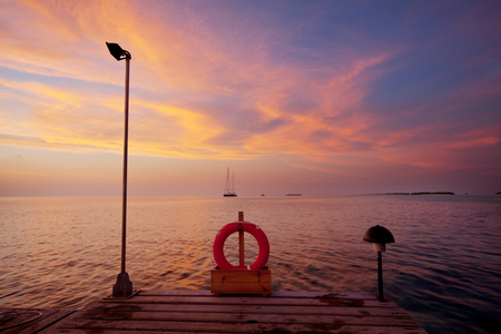 Scenic colorful sunset at the sea coast.の写真素材