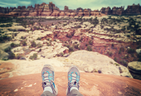 Hike in the Utah mountains. Hiking in unusual natural landscapes. Fantastic forms sandstone formations.の写真素材