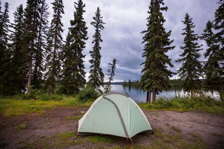 Hiking tent in the mountains.の写真素材