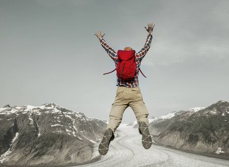 Jumping man in volcanic mountains, Bromo, Indonesiaの写真素材