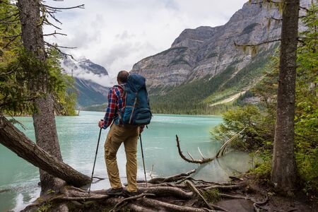 Hiking man in Canadian mountains. Hike is the popular recreation activity in North America.の写真素材