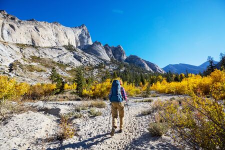 Hike in the autumn mountains. Fall season theme.の写真素材