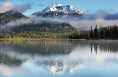 Serene beautiful lake in morning mountains, Oregon, USA.の写真素材