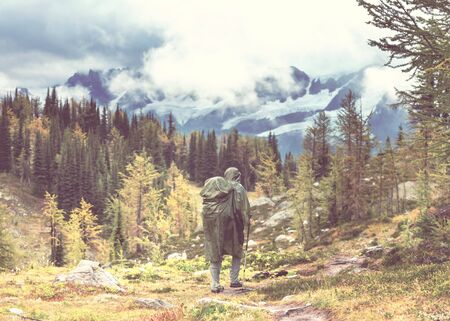 Hike in the autumn mountains. Fall season theme.の写真素材